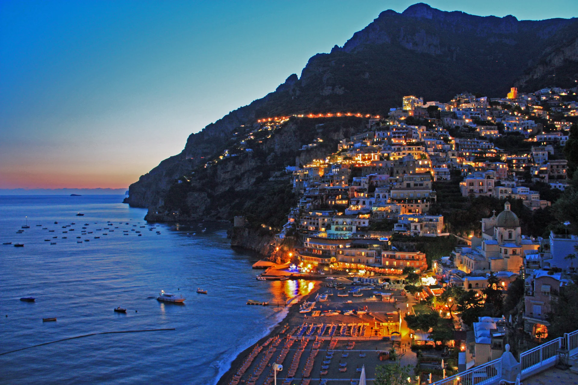 Warm evening light over Positano and the Mediterranean