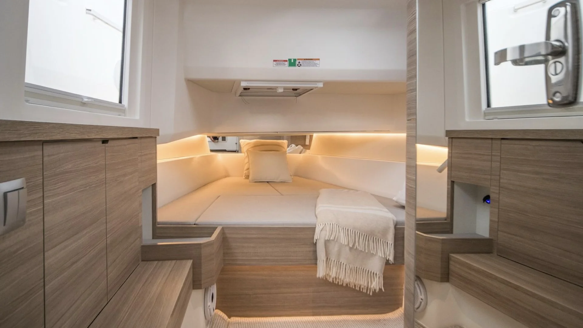 The private cabin, with a double berth and soft natural light